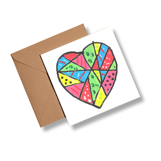 Colorful heart on a square card with a brown envelope on a white background.