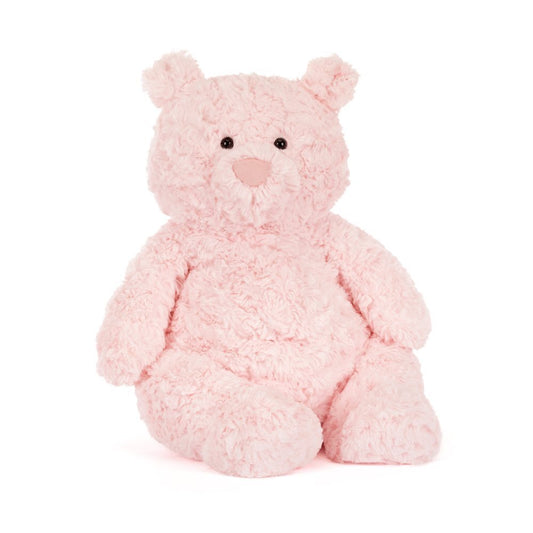 Pink teddy bear on a white background