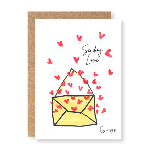 Greeting card with an open yellow envelope with  red hearts flying out, featuring the text 'Sending Love'.