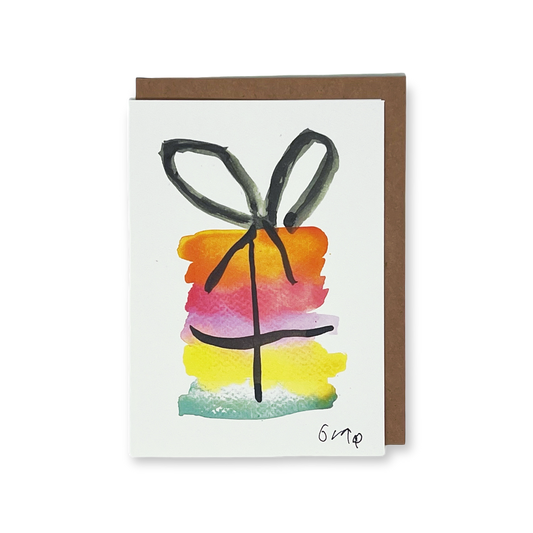 Greeting card with a colorful present design on a white background